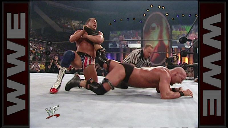 A rematch of their Summerslam encounter, Angle finally made the Bionic Redneck tap.
